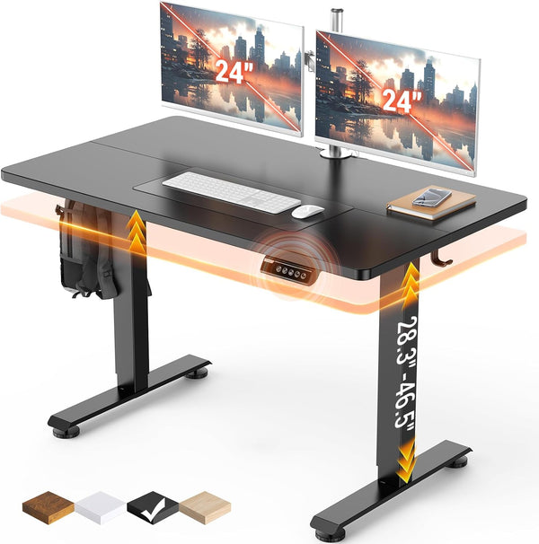 Adjustable height desk with two computer monitors on a white background